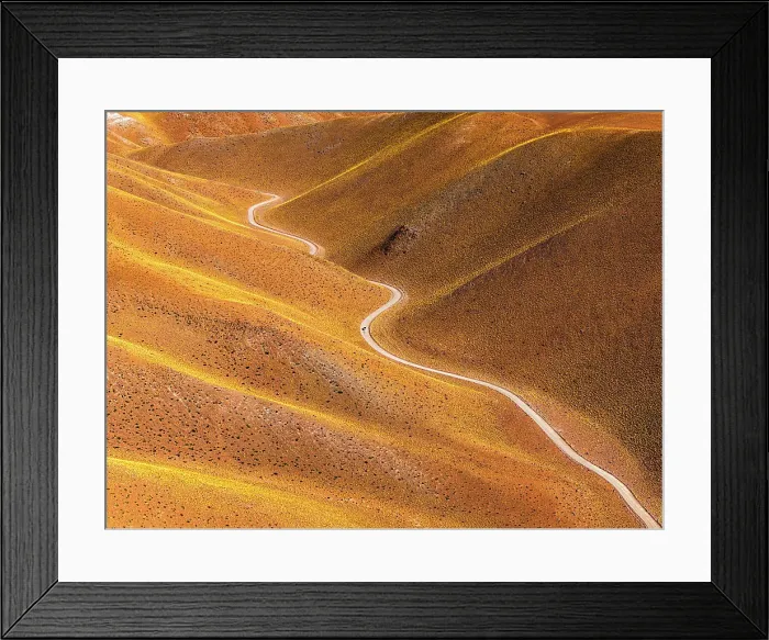 Framed Print : Winding road through colorful hills, Vega de los Colorados, Puna, Catamarca, Argentina Framed Print : Winding road through colorful hills, Vega de los Colorados, Puna, Catamarca, Argentina