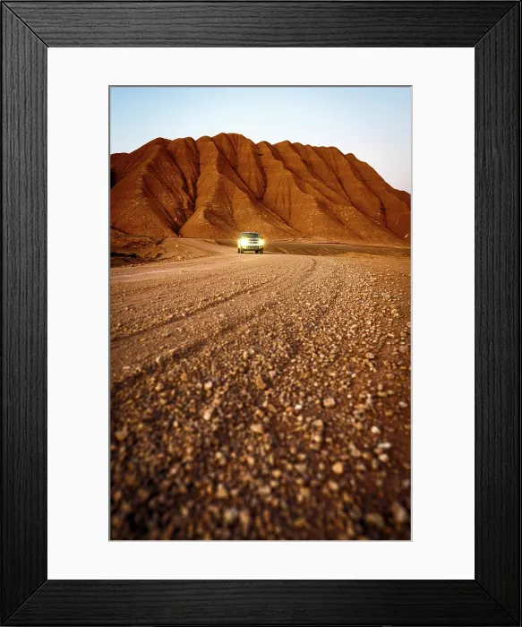 Framed Print : Pick-Up traveling at feet of red volcanic mountains, Labyrinth Desert, Puna, Argentina Framed Print : Pick-Up traveling at feet of red volcanic mountains, Labyrinth Desert, Puna, Argentina