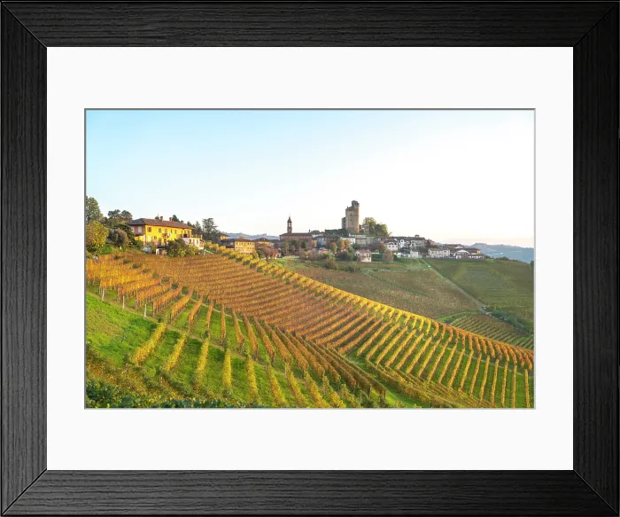 Framed Print : Autumn vineyards surround Serralunga d'Alba, Piedmont, Italy, known for Barolo wine production Framed Print : Autumn vineyards surround Serralunga d'Alba, Piedmont, Italy, known for Barolo wine production