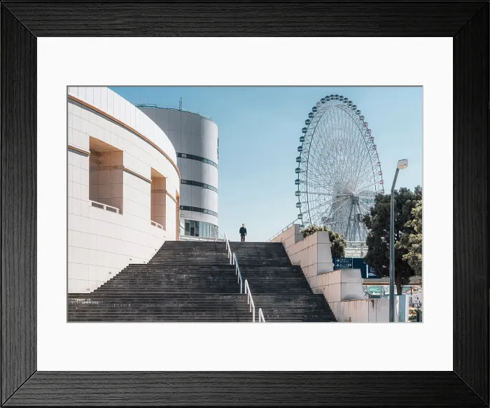 Framed Print : Man walks stairs in Yokohama, Japan, with Cosmo Clock 21 Ferris wheel in background Framed Print : Man walks stairs in Yokohama, Japan, with Cosmo Clock 21 Ferris wheel in background