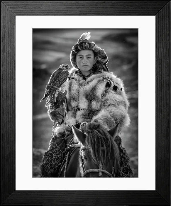 Framed Print : Portrait of a Kazakh boy on horseback wearing traditional fur clothing and holding his pet falcon, Western Mongolia, Asia Framed Print : Portrait of a Kazakh boy on horseback wearing traditional fur clothing and holding his pet falcon, Western Mongolia, Asia