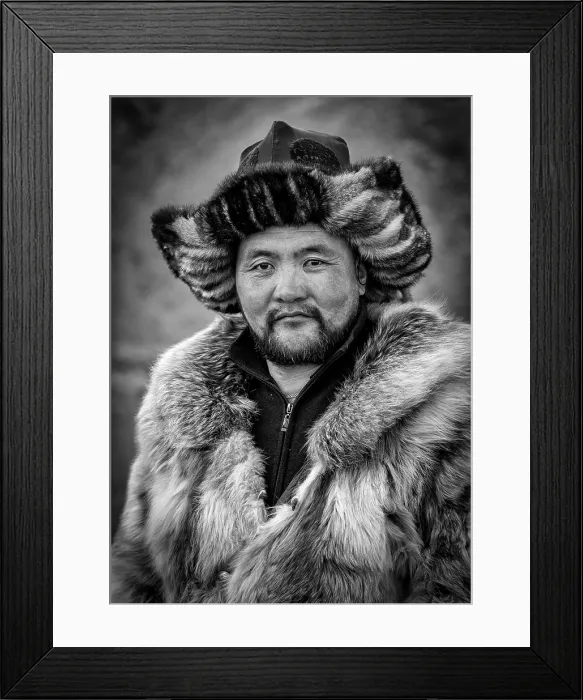 Framed Print : Portrait of a Kazakh Eagle Hunter wearing traditional fur clothing, Western Mongolia, Asia Framed Print : Portrait of a Kazakh Eagle Hunter wearing traditional fur clothing, Western Mongolia, Asia