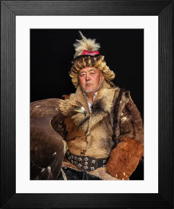 Framed Print : Portrait of a Kazakh Eagle Hunter wearing traditional fur clothing and posing with his trained golden eagle, Bayan-Ulgii Province, Western Mongolia, Asia Framed Print : Portrait of a Kazakh Eagle Hunter wearing traditional fur clothing and posing with his trained golden eagle, Bayan-Ulgii Province, Western Mongolia, Asia