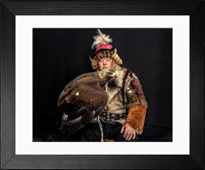 Framed Print : Portrait of a Kazakh Eagle Hunter wearing traditional fur clothing and posing with his trained golden eagle, Bayan-Ulgii Province, Western Mongolia, Asia Framed Print : Portrait of a Kazakh Eagle Hunter wearing traditional fur clothing and posing with his trained golden eagle, Bayan-Ulgii Province, Western Mongolia, Asia
