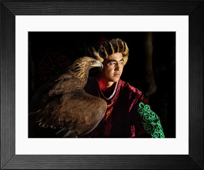 Framed Print : Portrait of a young Kazakh Eagle Hunter wearing traditional fur clothing and posing with his trained golden eagle, Bayan-Ulgii Province, Western Mongolia, Asia Framed Print : Portrait of a young Kazakh Eagle Hunter wearing traditional fur clothing and posing with his trained golden eagle, Bayan-Ulgii Province, Western Mongolia, Asia