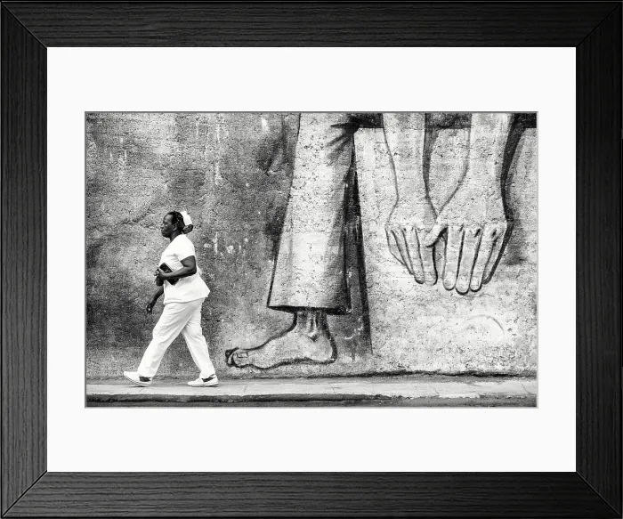 Framed Print : Local woman walking past street art on a wall in Havana Centro, Havana, Cuba, Caribbean Framed Print : Local woman walking past street art on a wall in Havana Centro, Havana, Cuba, Caribbean