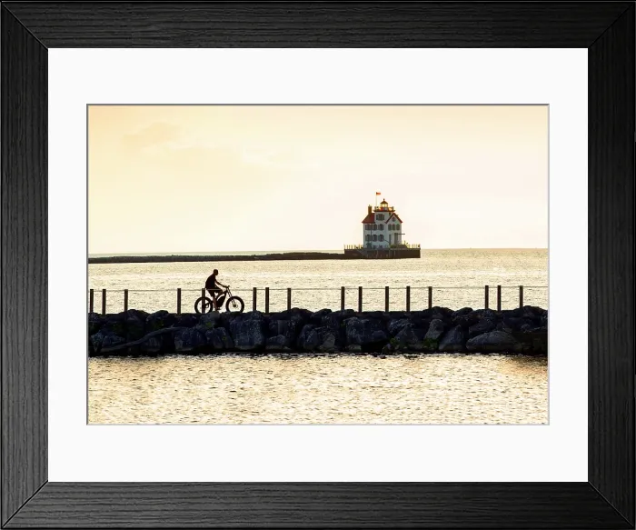 Framed Print : USA, Lorain, Ohio, Lake Erie, Lorain Lighthouse, Jewel Of The Port, Consistently Voted Best Lighthouse On Lake Erie, Bicycle Rider Along Sea Wall Framed Print : USA, Lorain, Ohio, Lake Erie, Lorain Lighthouse, Jewel Of The Port, Consistently Voted Best Lighthouse On Lake Erie, Bicycle Rider Along Sea Wall