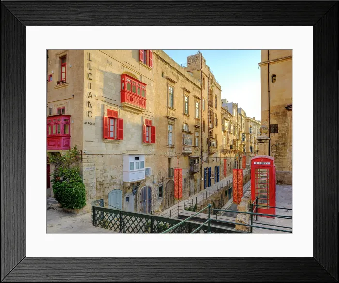 Framed Print : Typical Street Scene in the heart of Valletta, Red British Telphone Box, Valletta, Malta Framed Print : Typical Street Scene in the heart of Valletta, Red British Telphone Box, Valletta, Malta