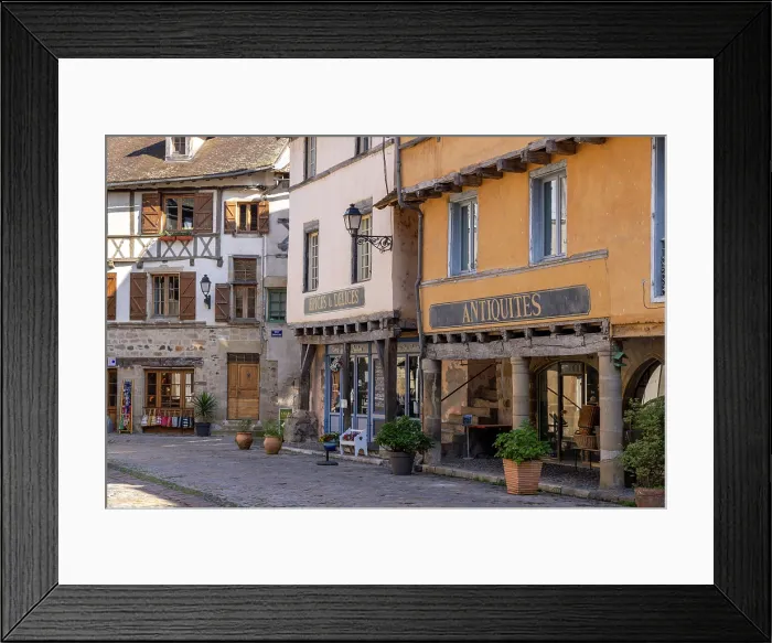Framed Print : Colourful buildings in the main square in Beaulieu-sur-Dordogne, Correze, Nouvelle-Aquitaine, France