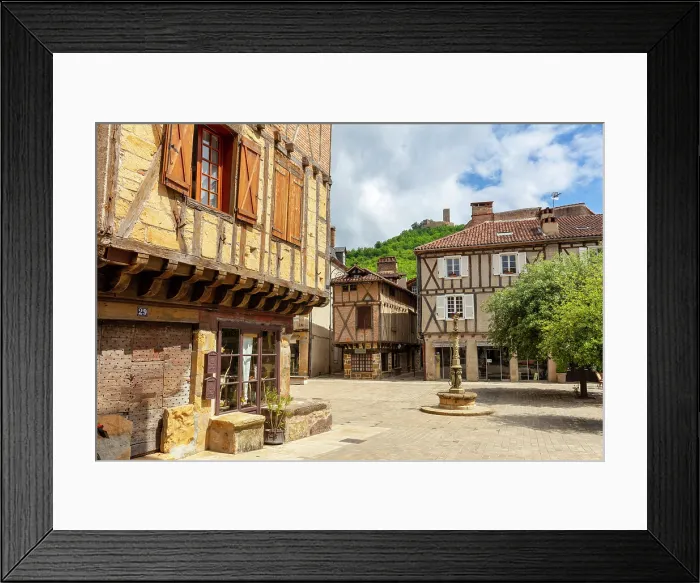 Framed Print : Half-timbered medieval houses, Mercadial Square, Saint Cere, Lot, Occitanie, France Framed Print : Half-timbered medieval houses, Mercadial Square, Saint Cere, Lot, Occitanie, France