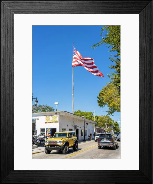 Framed Print : Large American flag on Truman Avenue, Key West, Florida, USA Framed Print : Large American flag on Truman Avenue, Key West, Florida, USA