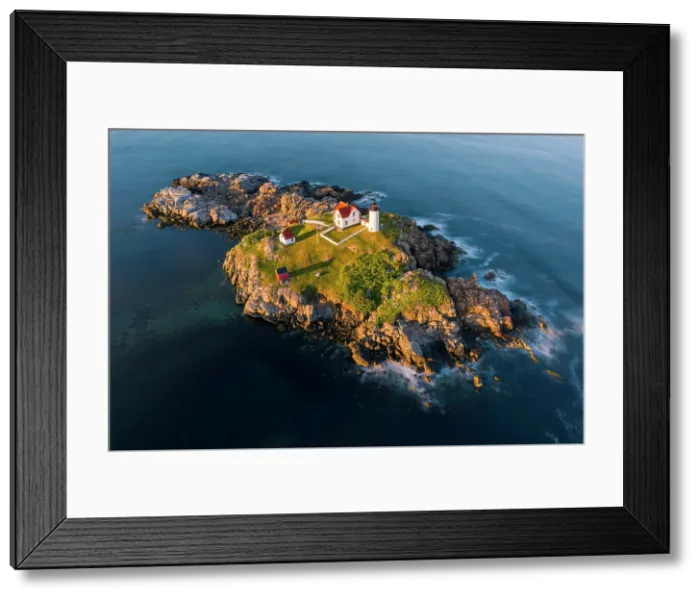 Framed Print : Aerial view of Nubble Lighthouse at sunset, Cape Neddick, Maine, USA Framed Print : Aerial view of Nubble Lighthouse at sunset, Cape Neddick, Maine, USA