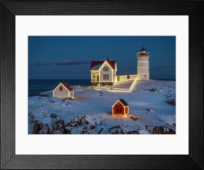 Framed Print : Winter dusk with holiday lights at Nubble Lighthouse, York, Maine, USA Framed Print : Winter dusk with holiday lights at Nubble Lighthouse, York, Maine, USA