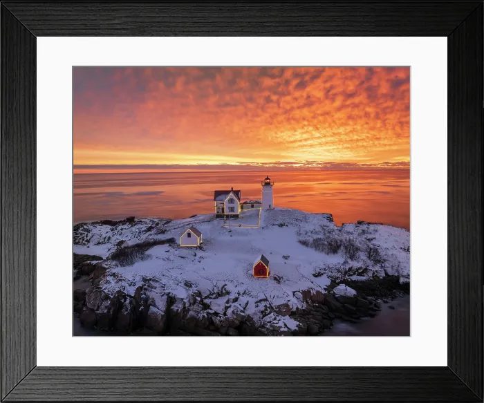 Framed Print : Winter sunrise with holiday lights at Nubble Lighthouse, York, Maine, USA Framed Print : Winter sunrise with holiday lights at Nubble Lighthouse, York, Maine, USA