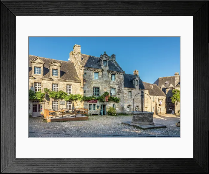 Framed Print : Historic granite stone houses at Place de l'Eglise in Locronan, Finistere, Brittany, France Framed Print : Historic granite stone houses at Place de l'Eglise in Locronan, Finistere, Brittany, France