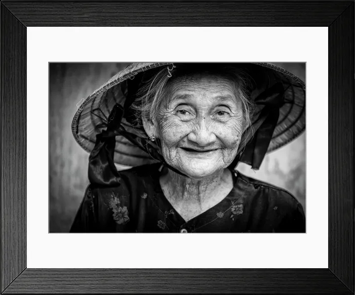 Framed Print : Portrait of an old lady wearing traditional conical hat, Hoi An, Central Vietnam Framed Print : Portrait of an old lady wearing traditional conical hat, Hoi An, Central Vietnam