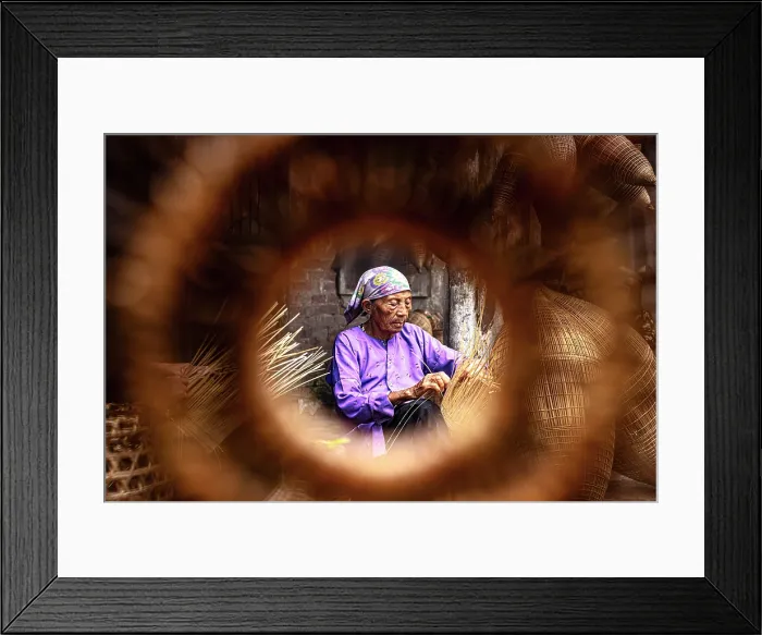 Framed Print : Local woman crafting bamboo fish traps, Hanoi, Vietnam. (MR)