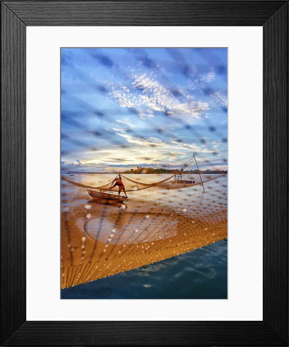 Framed Print : Man handling fishing nets suspended over a river, Hoi An, Quang Nam Province, Central Vietnam. (MR) Framed Print : Man handling fishing nets suspended over a river, Hoi An, Quang Nam Province, Central Vietnam. (MR)