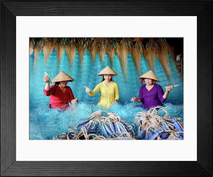 Framed Print : Women mending fishing nets, Vietnam. (MR)