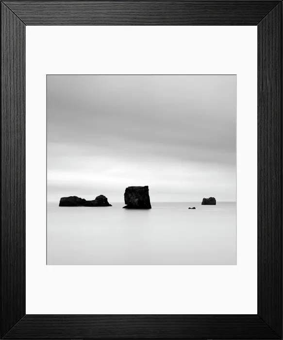 Framed Print : Minimalist image of rock stacks from the headland Dyrholaey, near Vik y Myrdal, South Iceland Framed Print : Minimalist image of rock stacks from the headland Dyrholaey, near Vik y Myrdal, South Iceland