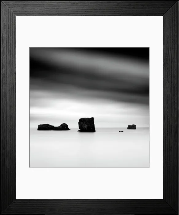 Framed Print : Minimalist image of rock stacks from the headland Dyrholaey, near Vik y Myrdal, South Iceland Framed Print : Minimalist image of rock stacks from the headland Dyrholaey, near Vik y Myrdal, South Iceland