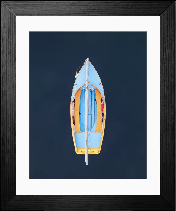 Framed Print : A blue sailboat at rest on Cape Cod, Massachusetts. I took the photo directly overhead using a drone for this angle and contrast of color Framed Print : A blue sailboat at rest on Cape Cod, Massachusetts. I took the photo directly overhead using a drone for this angle and contrast of color