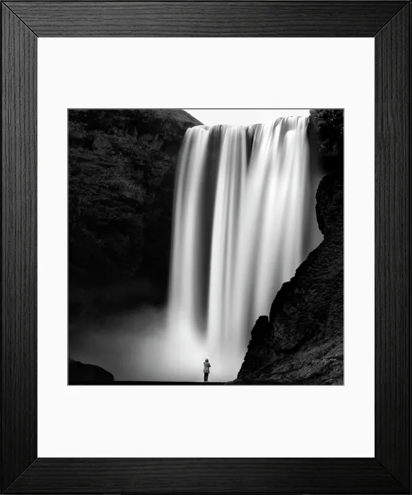 Framed Print : Woman standing and admiring Skogafoos waterfall, Skogar, South Iceland Framed Print : Woman standing and admiring Skogafoos waterfall, Skogar, South Iceland