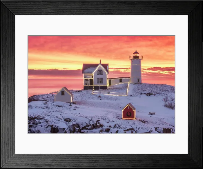Framed Print : Winter sunrise with holiday lights at Nubble Lighthouse, York, Maine, USA Framed Print : Winter sunrise with holiday lights at Nubble Lighthouse, York, Maine, USA