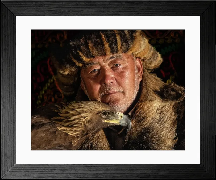 Framed Print : Portrait of a Kazakh Eagle Hunter wearing traditional fur clothing and posing with his trained golden eagle, Bayan-Ulgii Province, Western Mongolia, Asia Framed Print : Portrait of a Kazakh Eagle Hunter wearing traditional fur clothing and posing with his trained golden eagle, Bayan-Ulgii Province, Western Mongolia, Asia