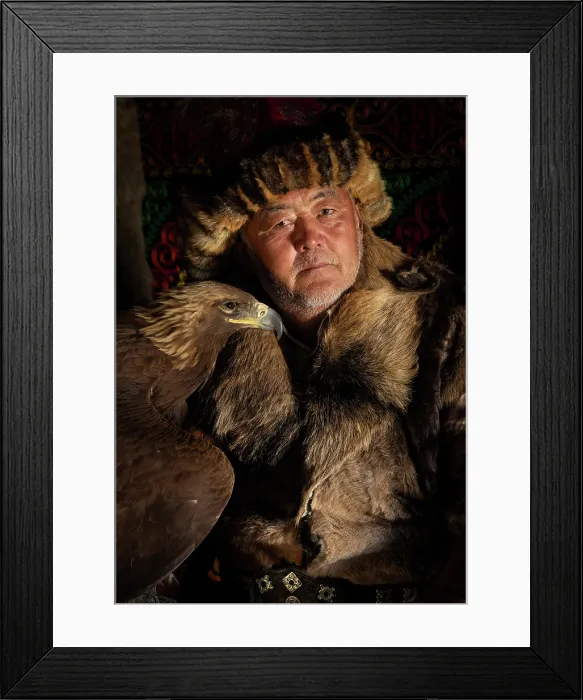 Framed Print : Portrait of a Kazakh Eagle Hunter wearing traditional fur clothing and posing with his trained golden eagle, Bayan-Ulgii Province, Western Mongolia, Asia Framed Print : Portrait of a Kazakh Eagle Hunter wearing traditional fur clothing and posing with his trained golden eagle, Bayan-Ulgii Province, Western Mongolia, Asia