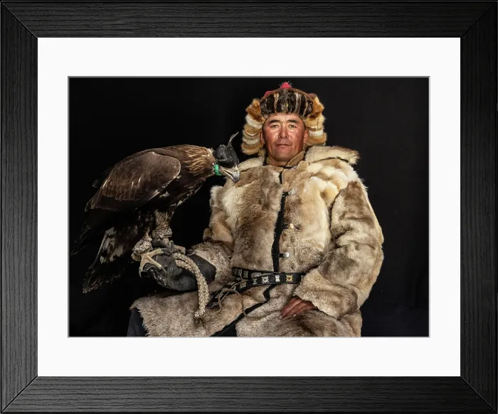Framed Print : Portrait of a Kazakh Eagle Hunter wearing traditional fur clothing and posing with his trained golden eagle, Bayan-Ulgii Province, Western Mongolia, Asia Framed Print : Portrait of a Kazakh Eagle Hunter wearing traditional fur clothing and posing with his trained golden eagle, Bayan-Ulgii Province, Western Mongolia, Asia