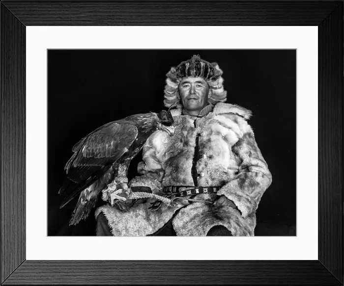 Framed Print : Black & white portrait of a Kazakh Eagle Hunter wearing traditional fur clothing and posing with his trained golden eagle, Bayan-Ulgii Province, Western Mongolia, Asia Framed Print : Black & white portrait of a Kazakh Eagle Hunter wearing traditional fur clothing and posing with his trained golden eagle, Bayan-Ulgii Province, Western Mongolia, Asia