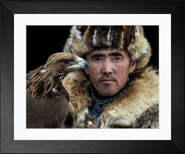 Framed Print : Portrait of a Kazakh Eagle Hunter wearing traditional fur clothing and posing with his trained golden eagle, Bayan-Ulgii Province, Western Mongolia, Asia Framed Print : Portrait of a Kazakh Eagle Hunter wearing traditional fur clothing and posing with his trained golden eagle, Bayan-Ulgii Province, Western Mongolia, Asia
