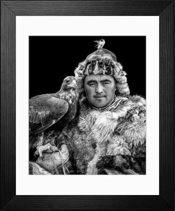 Framed Print : Black & white portrait of a Kazakh Eagle Hunter wearing traditional fur clothing and posing with his trained golden eagle, Bayan-Ulgii Province, Western Mongolia, Asia Framed Print : Black & white portrait of a Kazakh Eagle Hunter wearing traditional fur clothing and posing with his trained golden eagle, Bayan-Ulgii Province, Western Mongolia, Asia