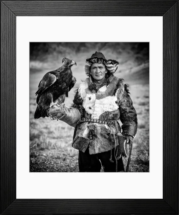 Framed Print : Black & white portrait of a Kazakh Eagle Hunter wearing traditional fur clothing and posing with his trained golden eagle, Bayan-Ulgii Province, Western Mongolia, Asia Framed Print : Black & white portrait of a Kazakh Eagle Hunter wearing traditional fur clothing and posing with his trained golden eagle, Bayan-Ulgii Province, Western Mongolia, Asia