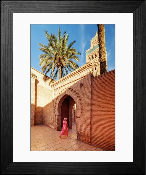 Framed Print : Lady in traditional dress walking through doorway at Koutoubia Mosque, Marrakech, Morocco Framed Print : Lady in traditional dress walking through doorway at Koutoubia Mosque, Marrakech, Morocco