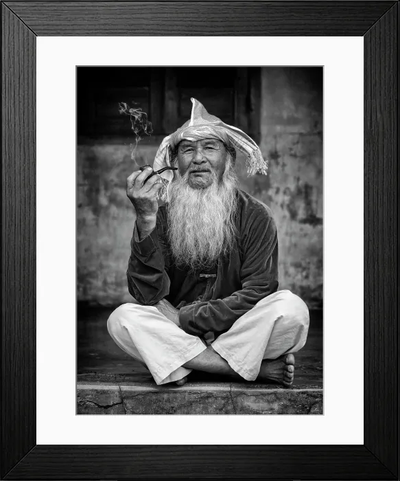 Framed Print : Portrait of an old man wearing conical hat and smoking a pipe, Phuoc Dan Village, Ninh Thuan Province, Vietnam Framed Print : Portrait of an old man wearing conical hat and smoking a pipe, Phuoc Dan Village, Ninh Thuan Province, Vietnam