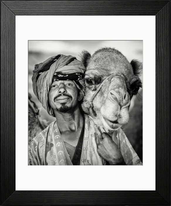 Framed Print : Portrait of a Berber man wearing traditional headscarf (Cheche), with his camel, Tinerhir, Morocco Framed Print : Portrait of a Berber man wearing traditional headscarf (Cheche), with his camel, Tinerhir, Morocco