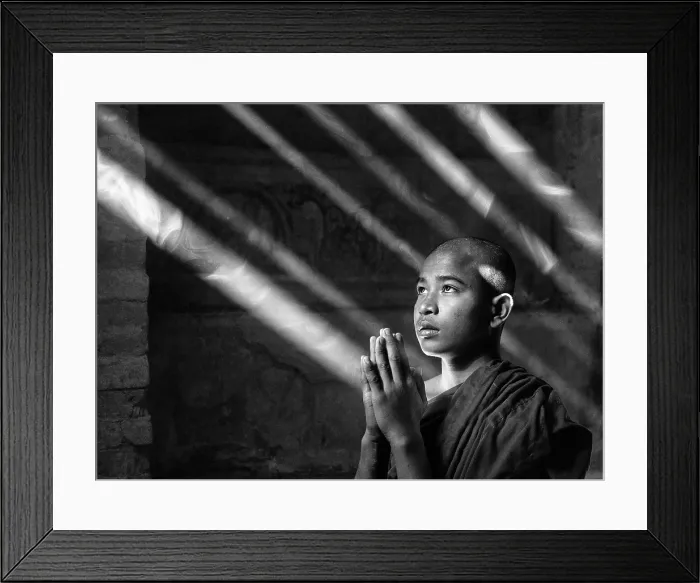 Framed Print : Young Buddhist Monk praying in an ancient temple, Bagan, Myanmar Framed Print : Young Buddhist Monk praying in an ancient temple, Bagan, Myanmar