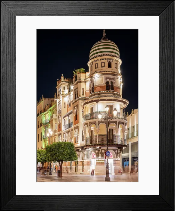 Framed Print : Night view of Edificio La Adriatica, Avenida de la Constitucion, Seville, Andalusia, Spain Framed Print : Night view of Edificio La Adriatica, Avenida de la Constitucion, Seville, Andalusia, Spain