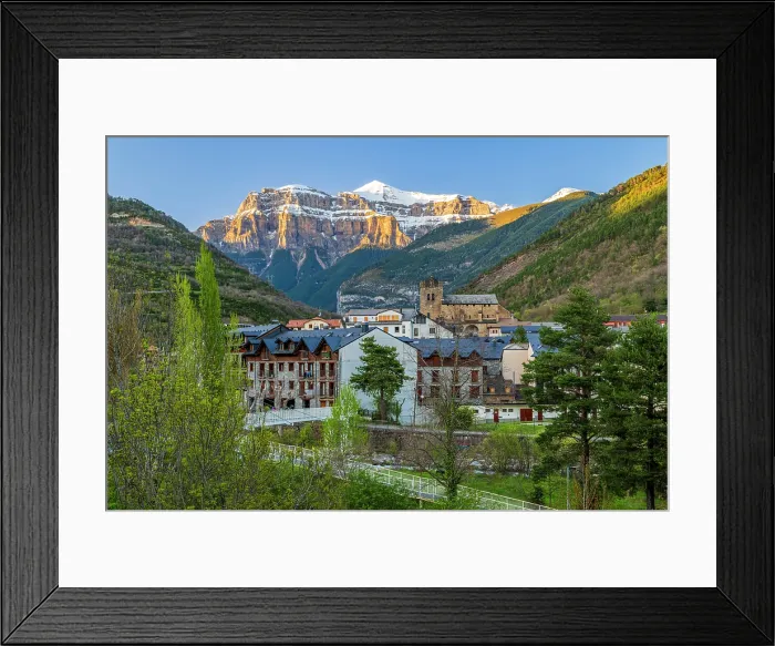 Framed Print : View of the town with Mondarruego mountain in the background at sunset, Broto, Aragon, Spain Framed Print : View of the town with Mondarruego mountain in the background at sunset, Broto, Aragon, Spain