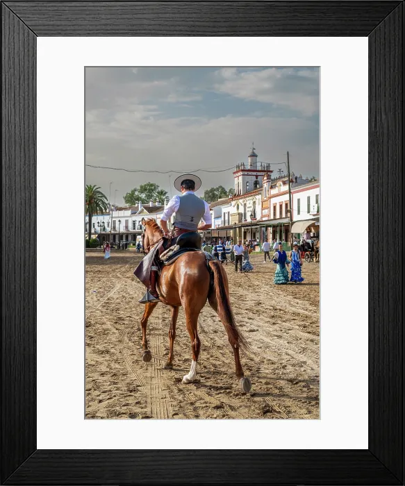 Framed Print : Horseman riding in a street during the Romeria de El Rocio pilgrimage, El Rocio, Huelva, Andalusia, Spain