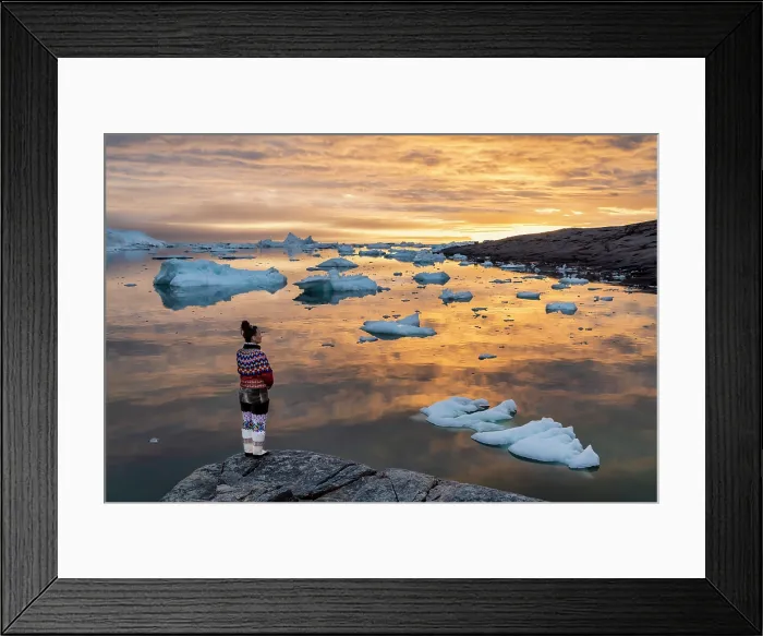 Framed Print : Woman at sunset in traditional Greenlandic costune at Oqaatsut, Greenland Framed Print : Woman at sunset in traditional Greenlandic costune at Oqaatsut, Greenland