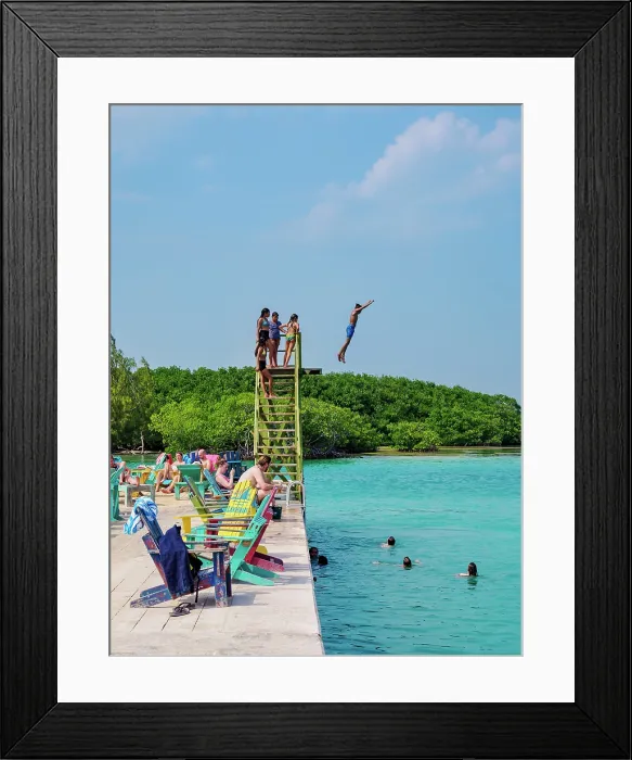 Framed Print : People swimming at The Lazy Lizard Bar and Grill, The Split, Caye Caulker, Belize District, Belize Framed Print : People swimming at The Lazy Lizard Bar and Grill, The Split, Caye Caulker, Belize District, Belize
