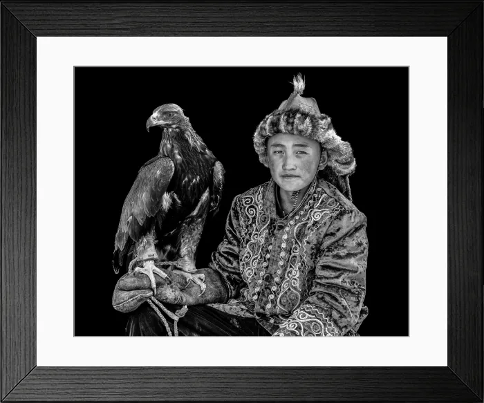 Framed Print : Black & white portrait of a young Kazakh Eagle Hunter posing with his trained golden eagle, Bayan-Ulgii Province, Western Mongolia, Asia Framed Print : Black & white portrait of a young Kazakh Eagle Hunter posing with his trained golden eagle, Bayan-Ulgii Province, Western Mongolia, Asia
