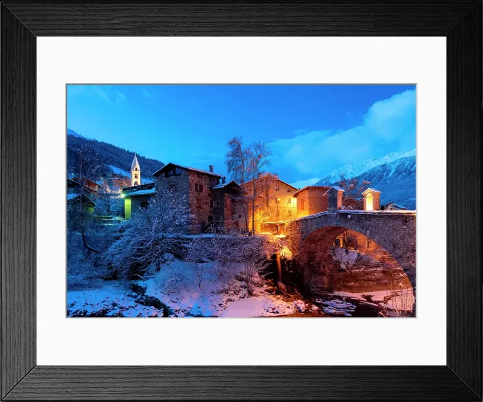 Framed Print : Little village of Bormio after snowfall during dusk, Bormio, Valtellina, Sondrio province, Lombardy, Italy