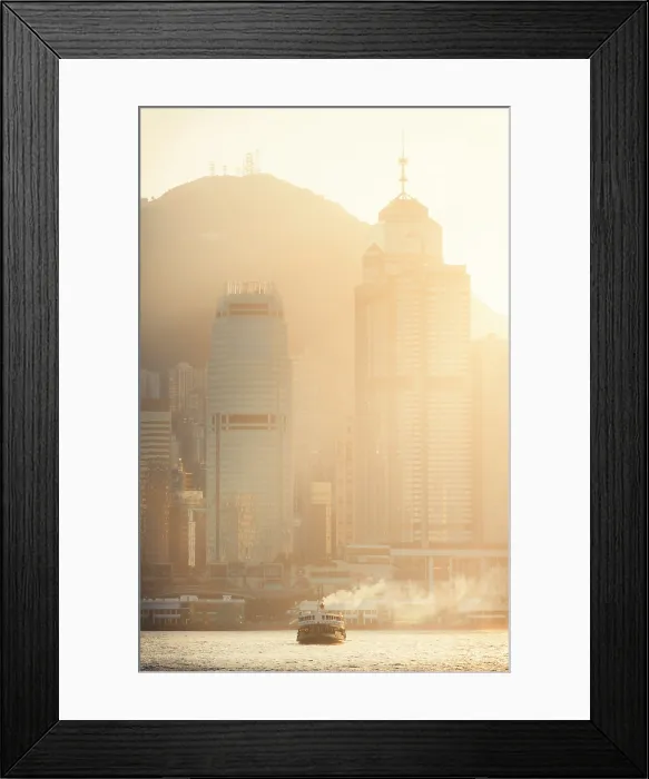 Framed Print : A boat in front of cityscape of Hong Kong, Tsim Sha Tsui, Kowloon, Hong Kong, China Framed Print : A boat in front of cityscape of Hong Kong, Tsim Sha Tsui, Kowloon, Hong Kong, China