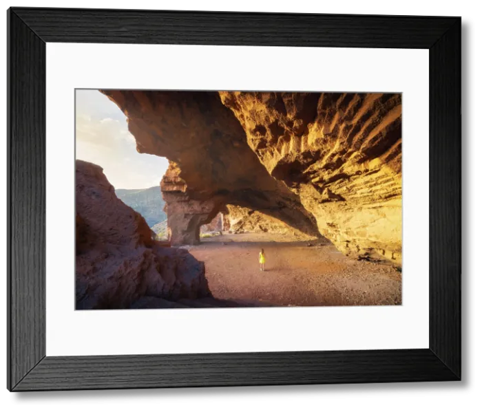 Framed Print : A tourist observes Cueva Roja at sunset, Santa Cruz de Tenerife, Tenerife, Canary Islands, Spain