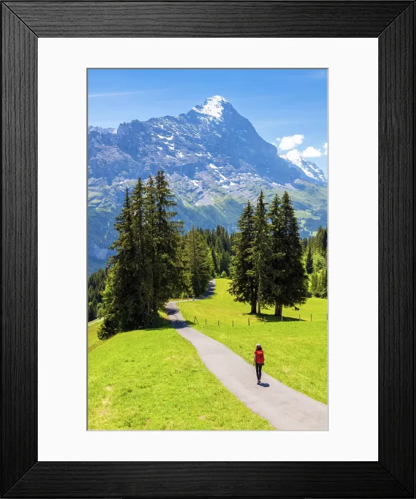 Framed Print : Girl walking along path towrds the Eiger mountain, Canton of Bern, Switzerland. (MR) Framed Print : Girl walking along path towrds the Eiger mountain, Canton of Bern, Switzerland. (MR)