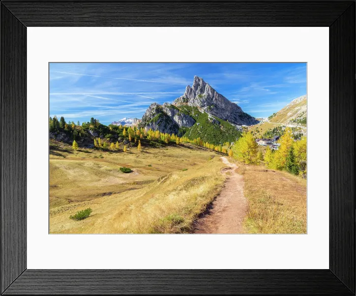 Framed Print : a trail towards Sass de Stria from the top of Passo Falzarego in autumn. Dolomites, Cortina d'Ampezzo, Belluno province, Veneto district, Italy